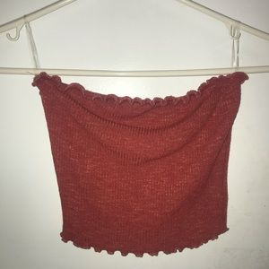 Rust colored crop top.